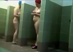 Mature moms showering after swimming