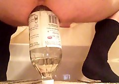 Large bottle anal insertion
