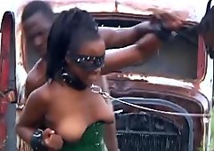 Enchained African babe gets abused by two horny black guys